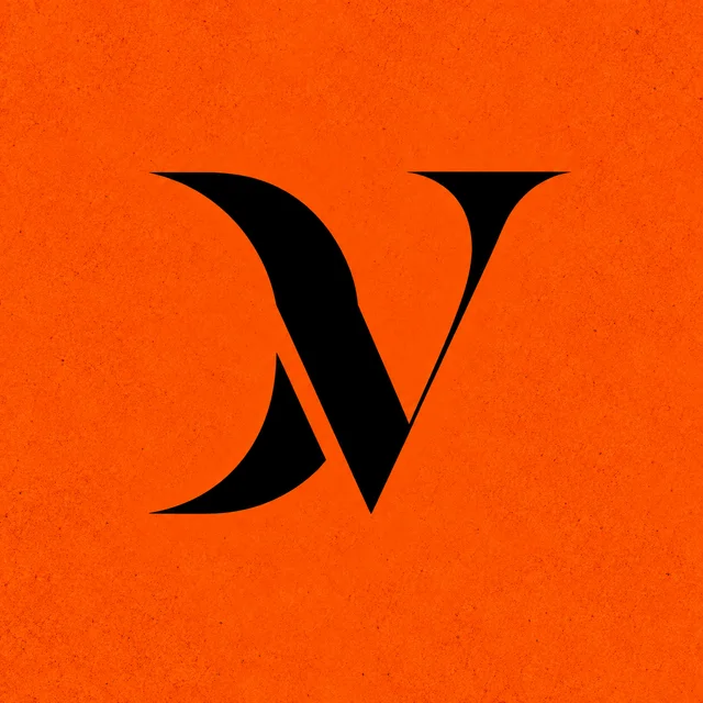 Original DRAVELL monogram artwork on an orange background.